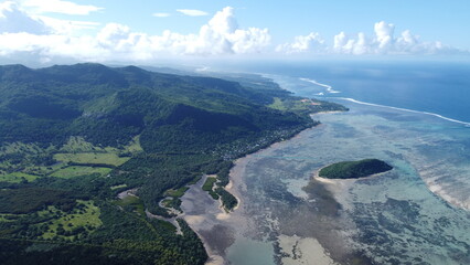 Aerial view from Le Morne Brabant looking out over turquoise lagoon, reef and ocean horizon, Mauritius © GeoWild