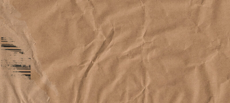 Frame made of brown beige old vintage paper with damaged barcode, crumpled wrinkled cardboard carton packaging package, pattern texture background banner panorama