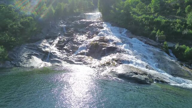Drone Zoom Out Revealing Hellesyltfossen Waterfall and Hellesylt Village