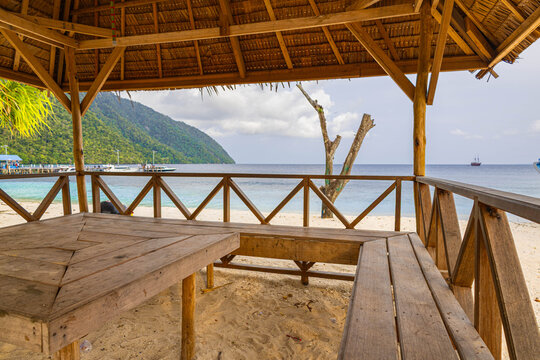 The beach scene with gazebo on the beach under palm tree