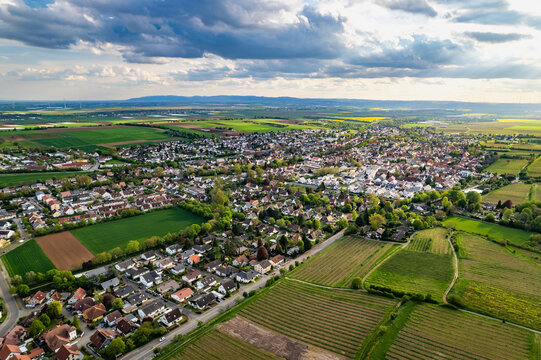 Aerial view of the residential houses and agricultural fields of Edingen-Neckarhausen, Mannheim, Baden-Wurttemberg, Germany.