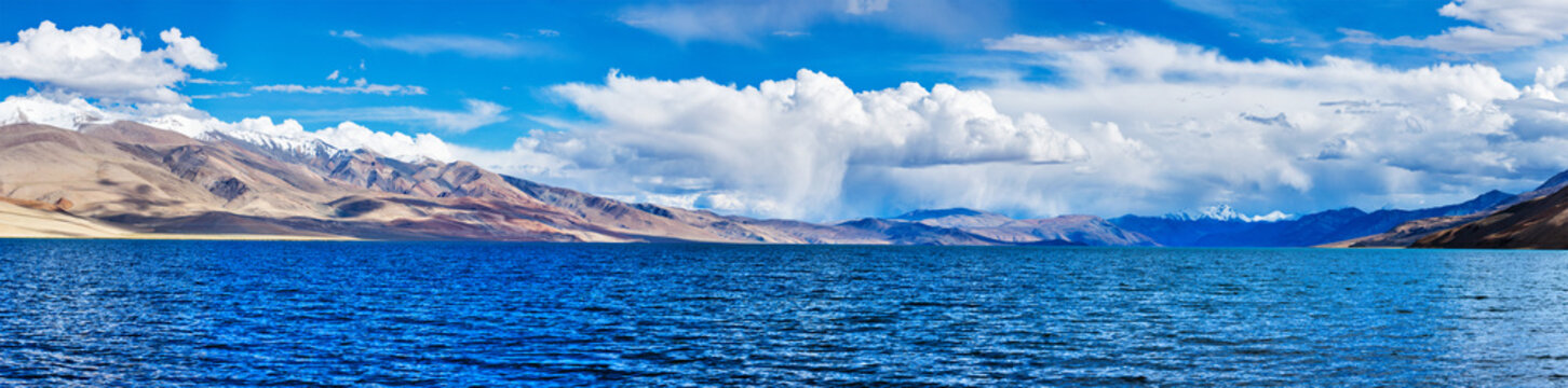 Scene featuring panorama of Himalayan lake Tso Moriri (official name - Tsomoriri Wetland Conservation Reserve) in Himalayas, Korzok, Changthang area, Ladakh, Jammu and Kashmir, India