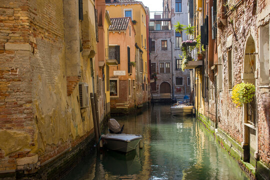 narrow canal with in Venice in Italy
