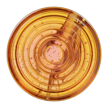 Disc shaped golden fruit drop lozenge candy with translucent ridge rings, isolated on transparent