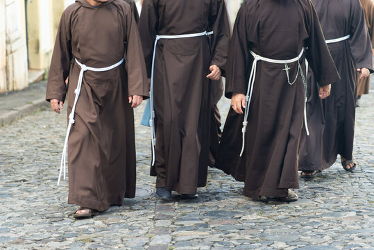 Friars feet while walking