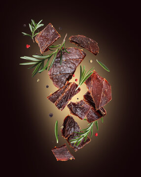 Delicious beef jerky with rosemary and allspice in the air