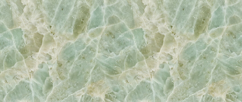 Marble texture featuring a beautiful blend of light green onyx stone layers with delicate natural fractures creates an elegant luxury backdrop for modern upscale branding designs