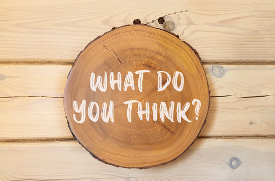 What do you think words symbol. Concept words What do you think on beautiful wooden circle. Beautiful wooden wall background. Business What do you think motivational support concept. Copy space.