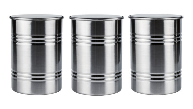 Three brushed stainless steel canisters with ribbed detailing, isolated on transparent background