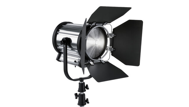Professional silver Fresnel spotlight with black barn doors, isolated on transparent background
