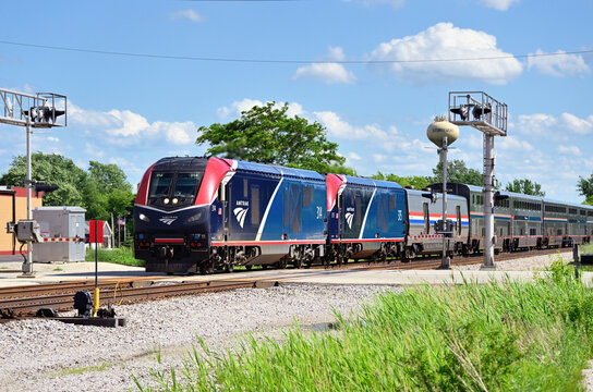 Amtrak's westbound Empire Builder traveling through a southeastern Wisconsin community prior to making its second stop at  Milwaukee during its transcontinenal journey to the Pacific Northwest.