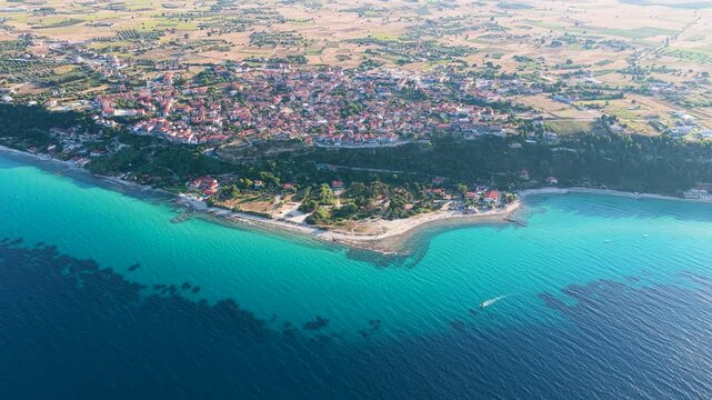Afytos coastal town on turquoise Aegean sea with sandy beaches