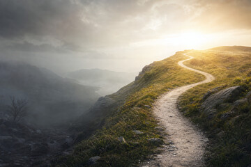 Obraz premium Winding path from foggy valley to sunlit hilltop
