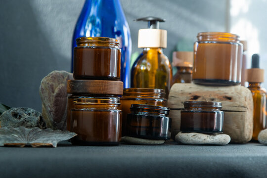 Amber Candles Glass Jars and Bottles with Natural Elements.