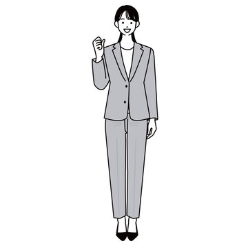 片手でガッツポーズをするスーツ姿の女性の全身イラスト