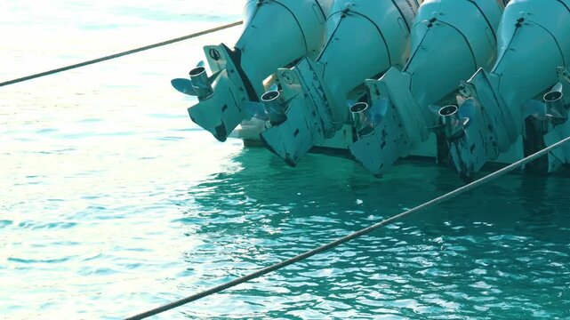Powerful Outboard Boat Motors in Clear Sea
