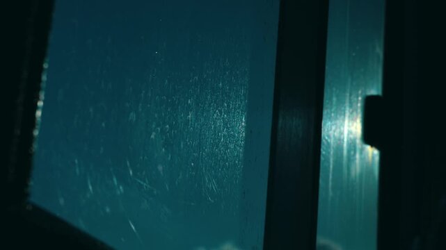 Sunlight Reflecting on Boat Window Glass