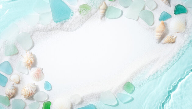 Sea Glass and Seashell Frame Background on White Sandy Beach with Copy Space