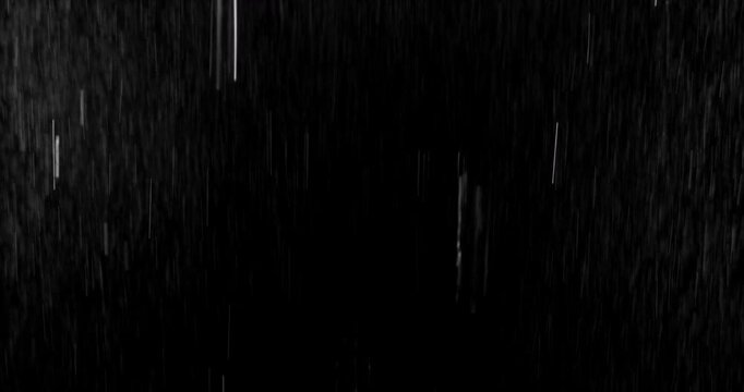 Realistic motion blurred rain streaks falling on a black background creating a natural weather VFX overlay ideal for compositing visual effects digital artwork atmospheric scenes and graphic design pr