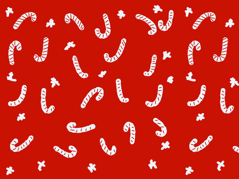 Christmas candy cane pattern on red background. Festive holiday wallpaper with sugar sweets.