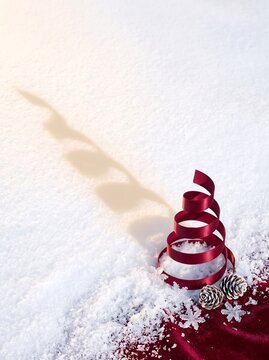 Premium Minimal Spiral Ribbon Christmas Tree on Snow with Copy Space