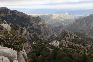 Obraz premium Mountain ridges with rock towers and canyon valley in Els Ports, Spain