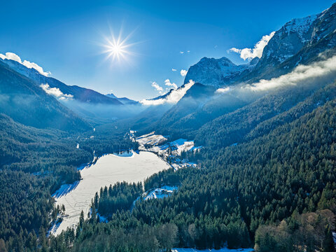 Aerial view of frozen lake Hintersee in Berchtesgaden Alps winter