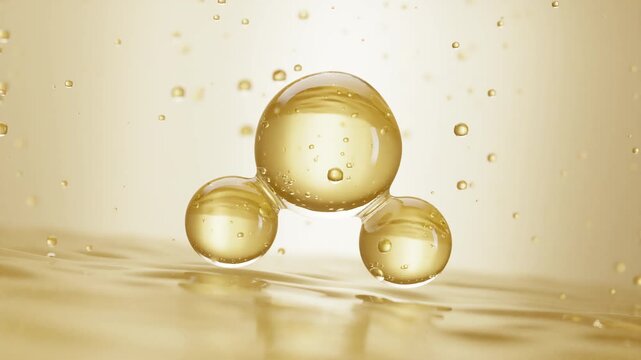 Golden oil liquid are formed into molecular shapes, Cosmetic Skin Care Serum.