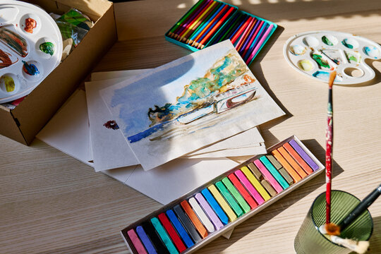 Painting Workshop. Artwork workplace with creative accessories and school supplies.