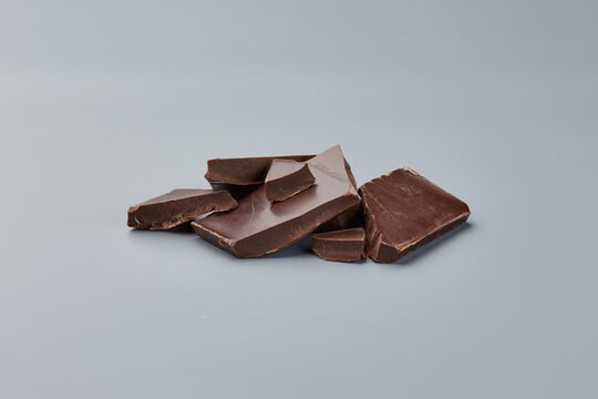Dark chocolate pieces breaking apart for sweet treats