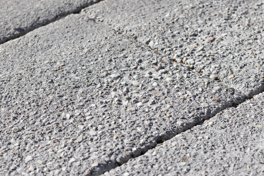 exposed aggregate concrete block pavement texture with stone surface
