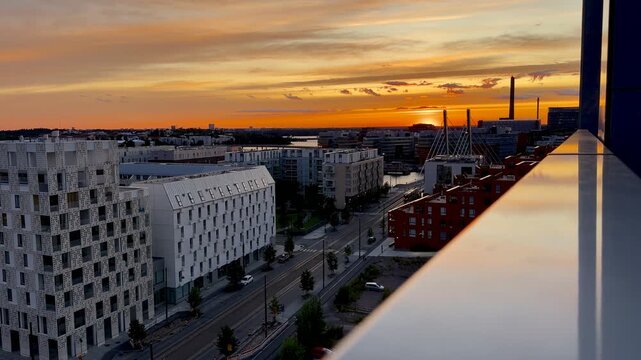 Vivid Orange Sunset over Jatkasaari City Buildings Helsinki