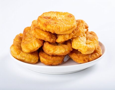 Plate of bean fritters. Plated authentic west african akara small deep fried black eyed pea fritters.