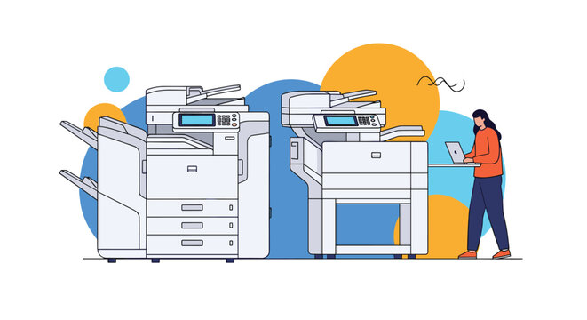 Businesswoman working on a laptop computer next to two large industrial grade office photocopiers and digital printing stations.