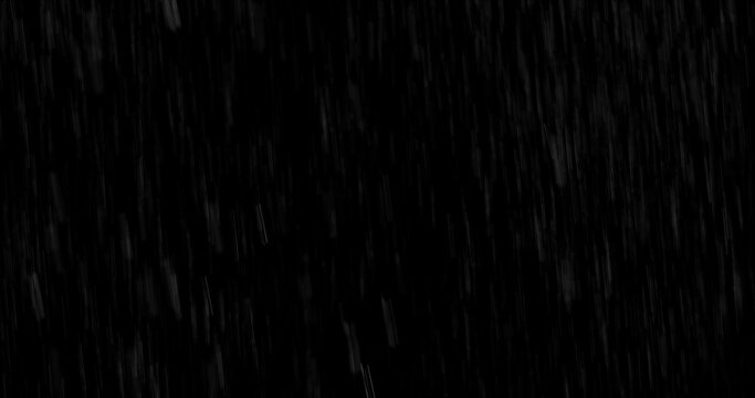 Realistic rain streaks isolated on a black background creating a realistic weather overlay with dynamic falling droplets perfect for visual effects compositing graphic design.