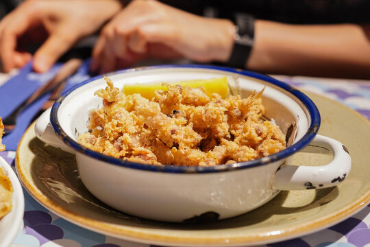Crispy Deep-Fried Baby Squid Tapas Served in a Vintage Dish