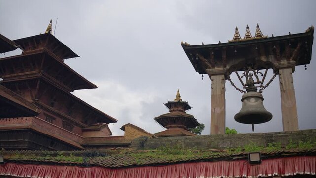 Historic Taleju Bell and Pagoda Roofs Patan Square Nepal 4K