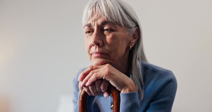 Elderly, woman and thinking with cane in retirement home for nostalgia, past moment or reminisce. Thoughtful, senior or female person contemplating with walking stick for old memory or daydreaming