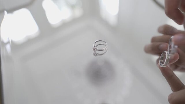 wedding ring rotation on the mirror table