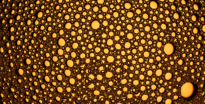 Orange liquid surface with abstract foam bubbles texture