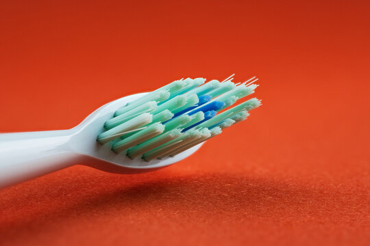 Electric toothbrush head showing bristles for oral hygiene