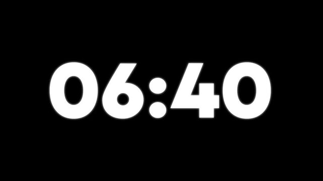 Bright white digital numbers zero seven twelve displayed on a solid deep black background screen