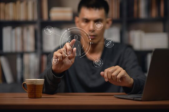 Young Man Interacting with Virtual Touchscreen Interface in Bookstore or Library Setting