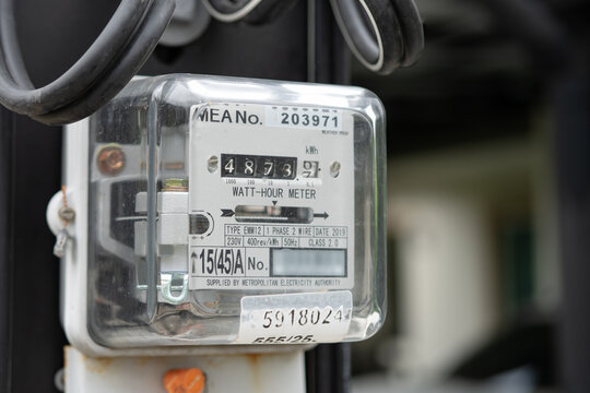 Electric measuring power meter for energy cost at home and office.