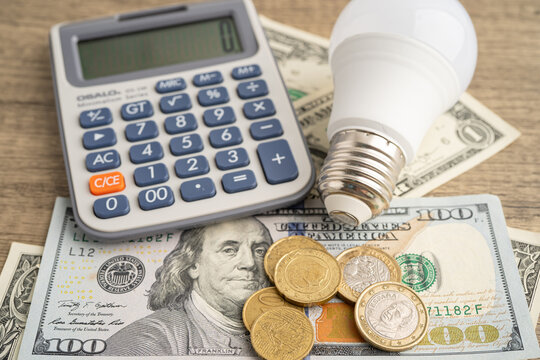 Cost of electric utilities with light bulb for payment.