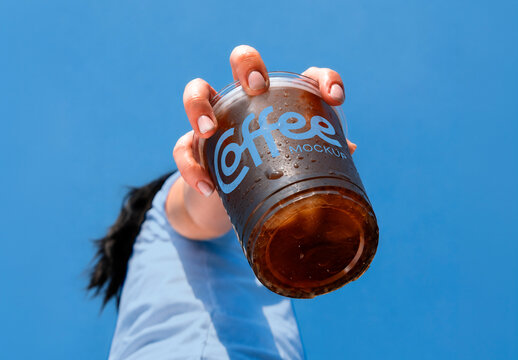 Hand Holding Iced Coffee Cup Mockup