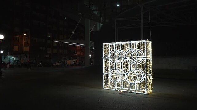 Christmas street lights decoration illuminating bilbao city park at night