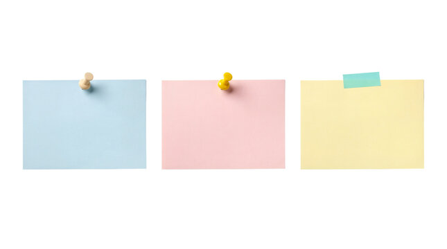 Colorful business-card-sized notes and cards pinned or taped up