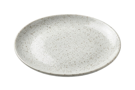 Speckled ceramic plate on white background