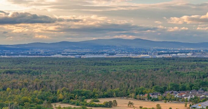 Evening drone pan over Frankfurt Airport and skyline Germany
